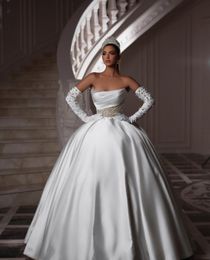 Elegant Ball Gown Wedding Dresses Bateau Long Sleeves Sequins Appliques Beaded Floor Length Ruffles Ruffles Pearls Folds Bridal Gowns Plus Size Vestido de novia