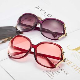 Frames Women's Sunglasses New Camellia hollow point paint rose Fashion versatile large frame sunglasses