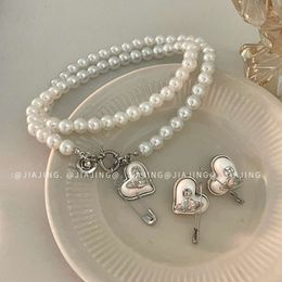 Desginer Viviene Westwoods Advanced Empress Dowager Saturn Paper Clip Pearl Necklace Earring Accessories Light Luxury Style Personalised Small and Popular Desig
