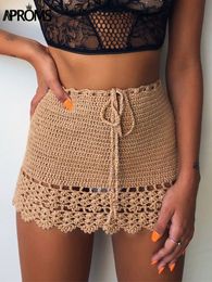 Skirts Aproms Elegant Handmade Cotton Crochet Mini Women Summer High Waist Bow Tie Skirt Ladies Beach Bikini Bottoms Saias 230411