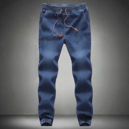 Mens denim jeans mens elastic leggings fashionable torn pants mens clothing blue cow