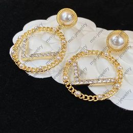 Metal hoop gold charm earrings. Rhinestone pearl luxury designer earrings. Valentine's day wedding bridal gifts designer Jewellery