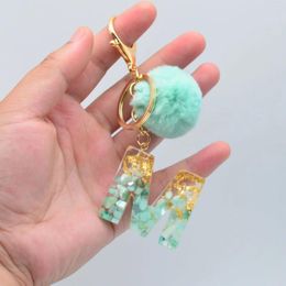 Keychains 26 Initials Letter Key Pendant With Green Fluffy Pompom For Fashion Girls Handbag Glitter Gradient Resin Alphabet Keychain Charm