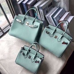 Platinum 2024 Designer Style Bag Mini One Shoulder Oblique Straddle Handbag Top Cowhide Star Fashion Silver Buckle