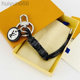 Zinc alloy keychains Fashion designer letter men and women key rings trend leather action figures couple keychain car bag pendant