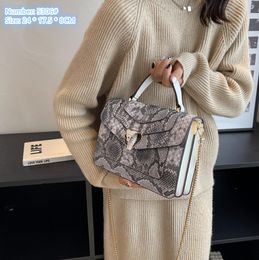 Factory sales ladies shoulder bags 6 colors this year's popular snake handbag street color leather mobile phone bag elegant embossed fashion backpack 5306#