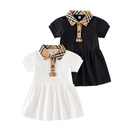 2023 TODDLERS Baby Girl Dress Summer Childrens kortärmad bomullsskjorta kjol Klassisk Plaid LAPEL Importerade anpassade tyger kläder