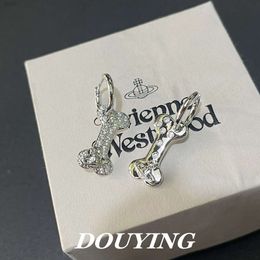 Designer Fashion viviene Westwood Viviennewestwood Sweet and Cool Style Asymmetric Saturn Inlaid Diamond Bone Ear Buckle Ear Ring Female Fashion Minority Design I