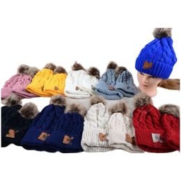 Carharttlys Hat Designer Original Quality Trendy new Fried Dough Twists knitting hat parent-child wool ball hat winter ear protection warm hat mother baby hat