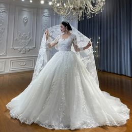 Luxury Church Ball Gown Wedding Dresses Long Sleeves Lace Appliqiues Glitter Ivory Tulle Bridal Gowns Long Train Corset 2024 Bride Dress Robe De Mariee