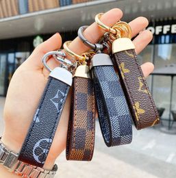 Luxury Men'S Waist Buckle Leather Presbyopia Keychain Pendant designer Car Key Chain Ring Fashion Couple Creative Gift H1011