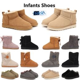 2024 Infantas crianças botas garoto tasman chinelos crianças neve inverno criança criança clássico Ultra mini garotos botas de peur garoto para meninas bebê com arco tazz mules sapatos