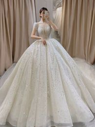 2024 splendido abito da sposa trasparente o-collo abito da ballo in pizzo applique di lusso con paillettes da sposa abiti da sposa da donna Robe De Mariee Abiti da Noiva