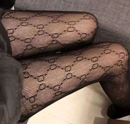 gglies Autumn and winter tight one-piece silk stockings pattern Elastic Black Fishnet tight silk stockings with hollow sexy889