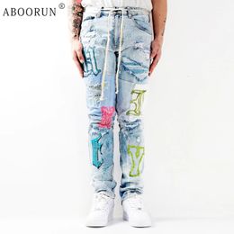 Men s Jeans ABOORUN Men Punk Letters Embroidery Ripped Denim Pants Hip Hop Streetwear for Male 231114