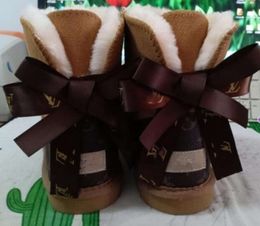 Hot sell AUS classical Design L Bow Fashion shoes women snow bowknot keep warm short winter Leather Sheepskin plush