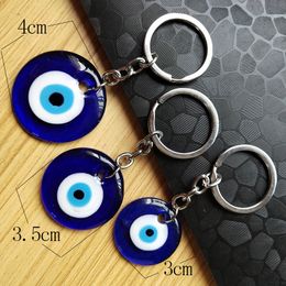 Evil Eye Key Chains Ring 3cm 3,5 cm 4 cm Diameter Ronde glas Lucky Turkse blauwe ogen Hang Charms Tas Tas Keyrings mode sieraden accessoires cadeaus auto sleutelhangers