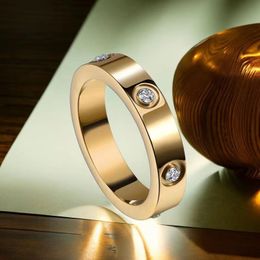 Дизайнерское Титановое Сталь Розовое Золото Любовное Кольцо для Женщин Цирконий Обручальные Кольца Мужчины Ювелирные Изделия Подарки Модные Аксессуары с Коробкой