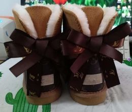 Hot sell AUS classical Design L Bow U boots women snow bowknot keep UGGsity warm short winter Genuine Leather Sheepskin plush rise