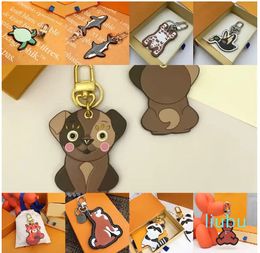 Classic Cartoon Cute Tiger Keychain Wallet Keyring Animal Car Penguin Letter Fox Keychains Women Charm Pendant Accessories