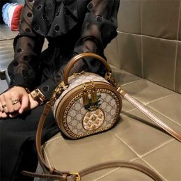 Bag 32% OFF Designer handbag Hong Kong Women's New Retro One Shoulder Genuine Leather Handheld Straddle Small Round Bag Tide