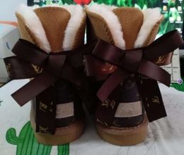 Hot sell AUS classical Design L Bow U boots women snow bowknot keep warm simple short winter Genuine Leather Sheepskin plush UGGsity