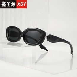 New Korean version small frame glasses oval shaped men's and women's ins sunglasses popular on the internet fashionable street photos sunshade