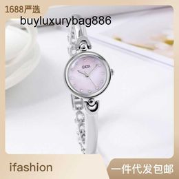 Designer-Uhren im minimalistischen Design, kleine und exquisite Armbanduhr mit rundem Zifferblatt, modische koreanische Version, vielseitiger Quarz