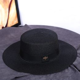 Wholesale Straw Hat European and American Retro Golden Woven Bowler Hat Female Wide Brim Sun Protection Sunshade Flat-Top Cap