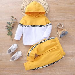 Rompers 0 2 Year Old born Baby Girls And Boys Spring Autumn Cotton Long Sleeve With Hat Stitching Ribbon Fashion Sports Suit 231117