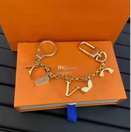 Keychains Lanyards Fashion Letter Designer Metal Womens Bag Charm Pendant Auto Parts accessories gift Motion current 60ess