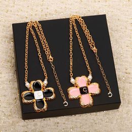 Luxury quality charm pendant necklace with black and pink Colour design brooch in 18k gold plated nature shell beads PS4887A