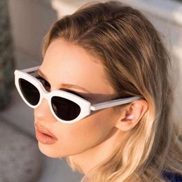 New high-end black cat's eye sunglasses with trendy triangular frame glasses for men and women's street photography sunglasses