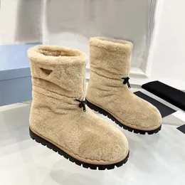 Stivaletti da donna di design di lusso Moda invernale Stivali di lana impermeabili con fondo piatto Scarpe da neve con fondo piatto 35-41 Con scatola