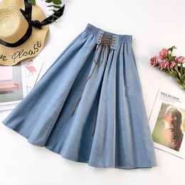 Skirts PEONFLY Autumn Winter Fashion Women Skirt Solid Colour Lace-up High Waist Denim Skirt Retro Pleated Midi Denim Flared Skirts 230417