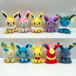 Manufacturers wholesale 10 styles of 20cm Bikachu Ibu plush toys cartoon film and television peripheral dolls for children's gifts