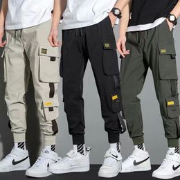 Men's Pants Thin Streetwear Casual Pants Men Ribbons Harem Jogging Pants Male Slim Fit Spring Cargo Pants Multi-Pockets Women Trouser Jx1 230418