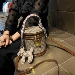 60% OFF 2024 Designer handbag Hong Kong Women's New Popular Commuter One Shoulder Handheld Small Genuine Leather Cross Bucket Bag Tide