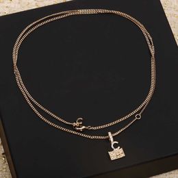 Luxury quality charm pendant necklace with padlock design in 18k gold plated and sparkly diamond have stamp box PS4896A