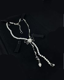 Pendant Necklaces High quality luxury jewelry, fashionable jewelry, European and American jewelry, new bow pearl splicing necklace