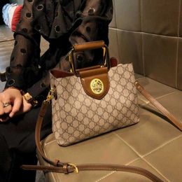 60% OFF 2024 Designer handbag Hong Kong Women's New Advanced Fashion Diagonal Straddle Small Leather One Shoulder Portable Bucket Bag