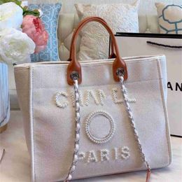 Women's Luxury Fashion Classic Canvas Beach Bag Large Capacity Small Chain Packs Big Handbags VL8N Designer Handbag Online sale