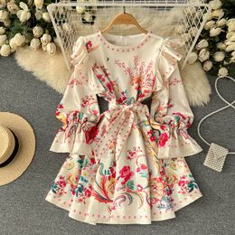 European and American ins style dress palace style round neck ruffled edge bow tie waist up flared sleeves medium length printed dress