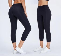 L2047 Womens Yoga Leggings Nake Feeling Capri Pants HighRise Outfit No TLine Elastic Tight Solid Color Sports Trousers6740014