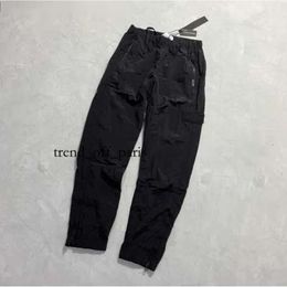 Stones Island Brand Designers Pants Stone Metal Nylon Pocket Badge Casual Trousers Thin Reflective 929 1