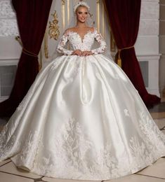 2024 Gorgeous Ball Gown Wedding Dress Sheer Neck Long Sleees Beading Pearls Lace Satin Bride Gowns Arabic Dubai Vestido De Novia Casamento Custom Made