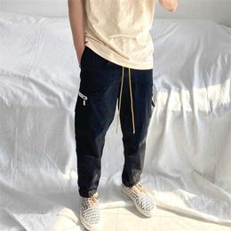 Designer Clothing Pant RHUDE Multi Pocket Work Clothes Buckle Pills Zipper Work Clothes Straight Tube Men's High Street Casual Pants Streetwear Trousers