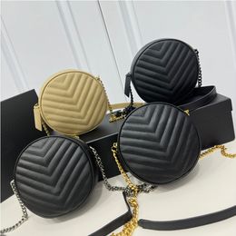 7A Womens small round bag metal chain shoulder strap diagonal cross made of high-quality caviar cowhide Genuine leather material