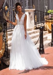 2024 Sexy Backless Boho Wedding Dress V Neck Lace Appliques Long Tulle A Line Bridal Gowns Sleeveless Summer Beach Bride Dresses