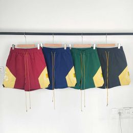 Niche 23ss Beauty Trend Rhude Embroidery Colour Matching Lace Up Elastic Men's and Women's Casual Five Point Shorts